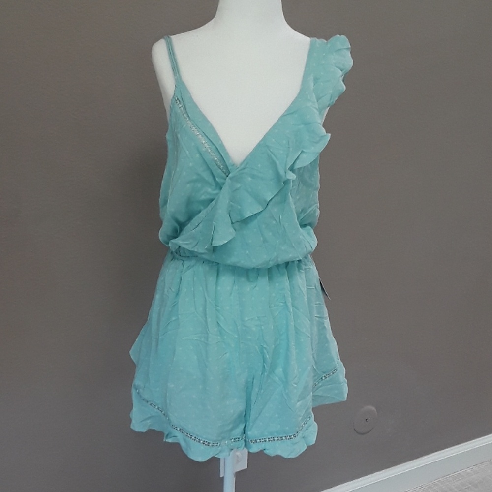 Free people light teal romper